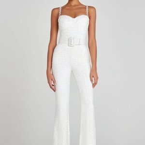 Nadine Merabi Lucinda white jumpsuit w/ rhinestone straps. Size 4 (small)